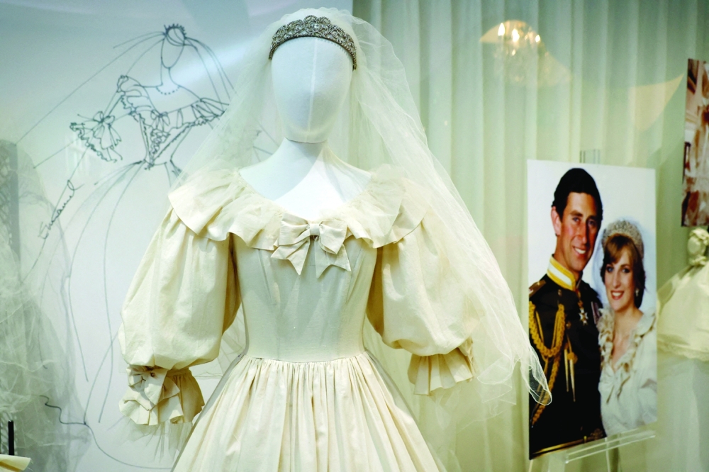 The final calico toile for Princess Diana's Royal wedding gown designed by David and Elizabeth Emanuel is displayed next to sketches and sewing machine in the 'Princess Diana's Style & A Royal Collection', the largest collection of the Princess of Wales' fashion ever to appear at auction in history, at a public exhibition in The Museum of Style Icons, in Newbridge, Ireland, June 9, 2025. 