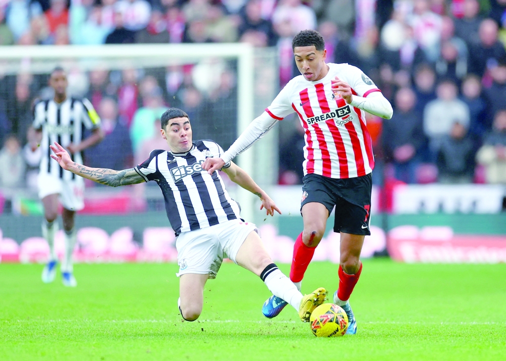 FIle photo: Newcastle United's Miguel Almiron in action with Sunderland's Jobe Bellingham (L). — Reuters