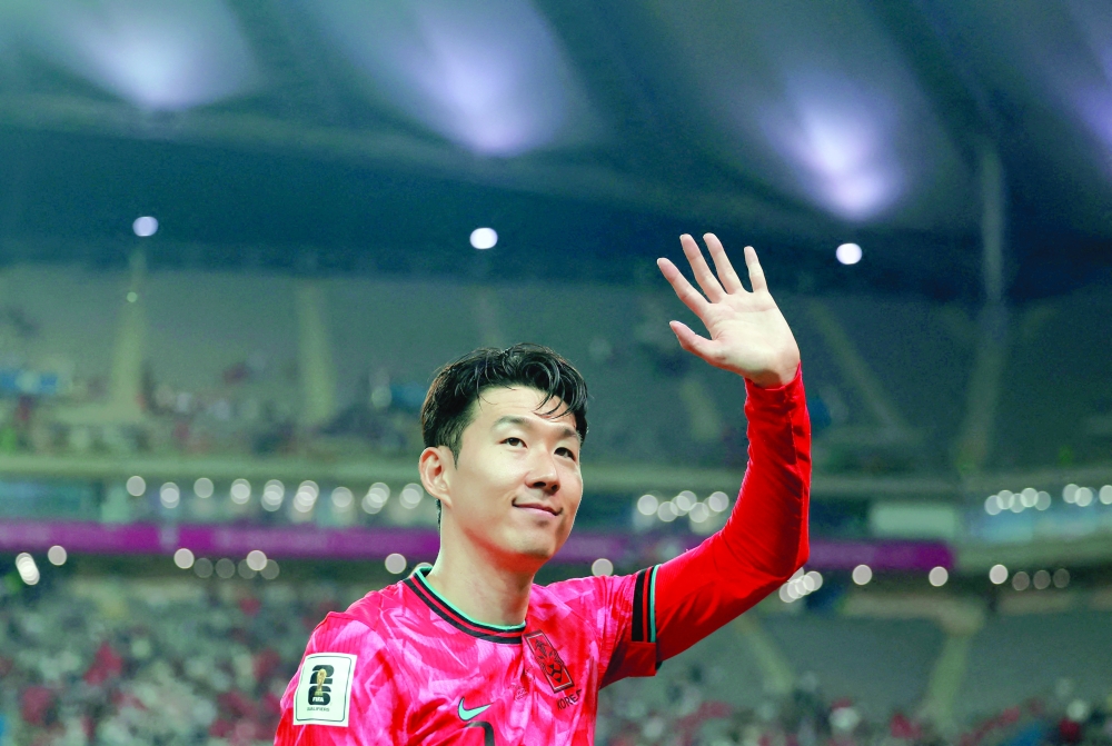 South Korea's Son Heung Min waves to the fans after the match. — Reuters