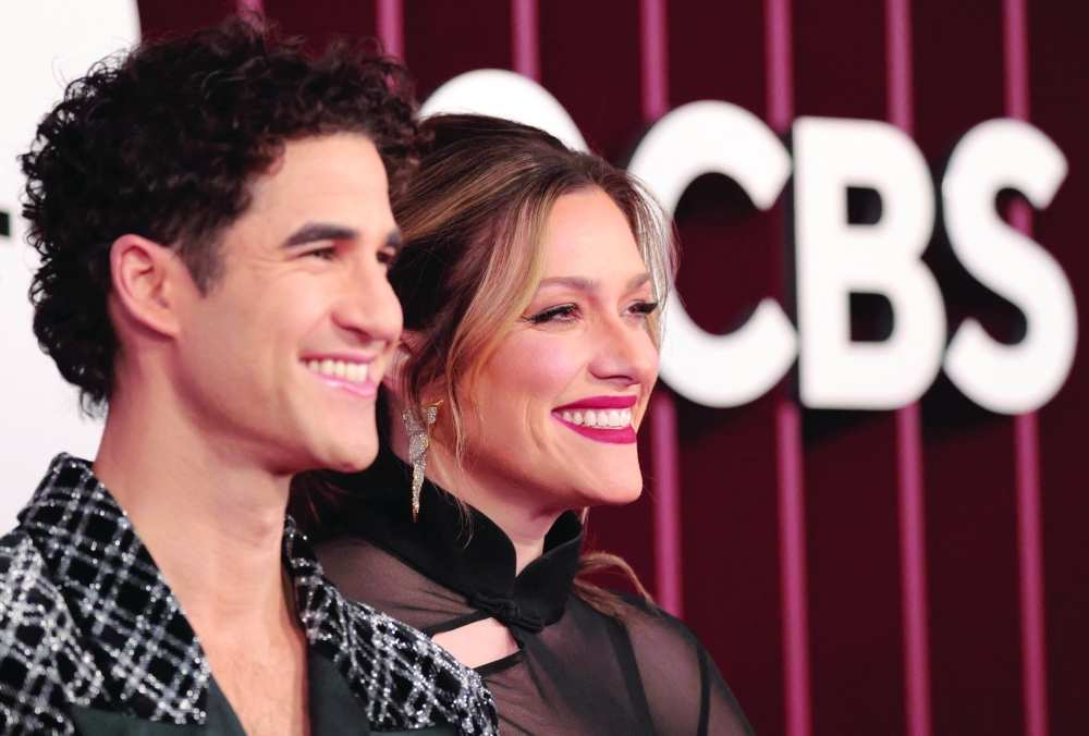 US actor Darren Criss and his wife producer Mia Swier attend the 78th Tony Awards at Radio City Music Hall in New York on June 8, 2025. 
