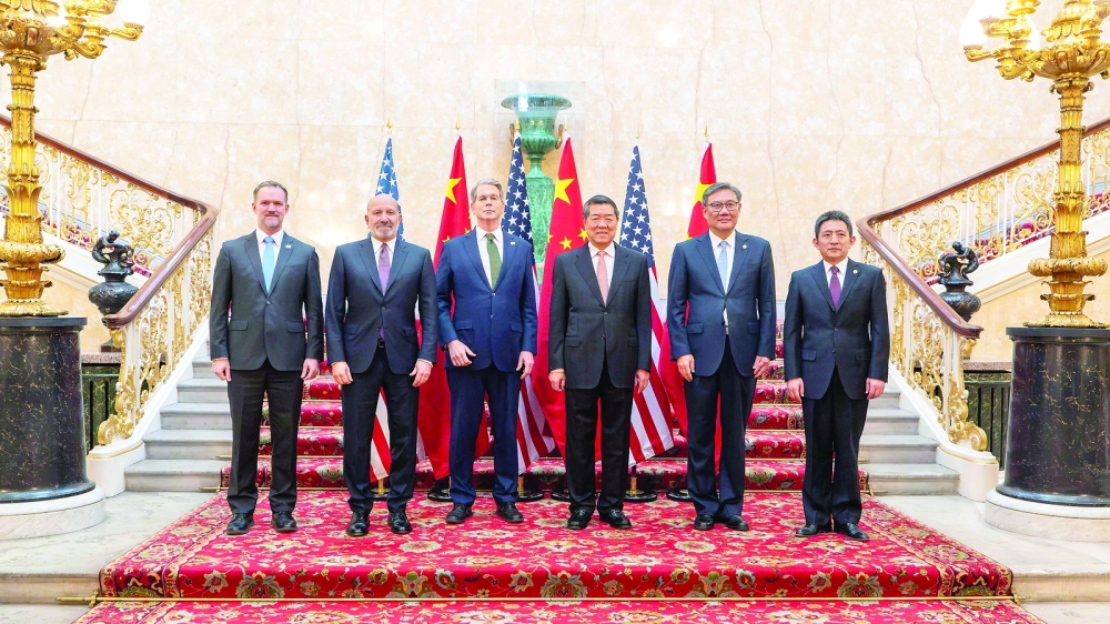 US Trade Representative Jamieson Greer, US Secretary of Commerce Howard Lutnick, US Secretary of Treasury Scott Bessent, Chinese Vice Premier He Lifeng, Chinese Commerce Minister Wang Wentao, and Chinese International Trade Representative and Vice Minister of Commerce Li Chenggang, pose for a photo during trade discussions at the Lancaster House in London. — AFP