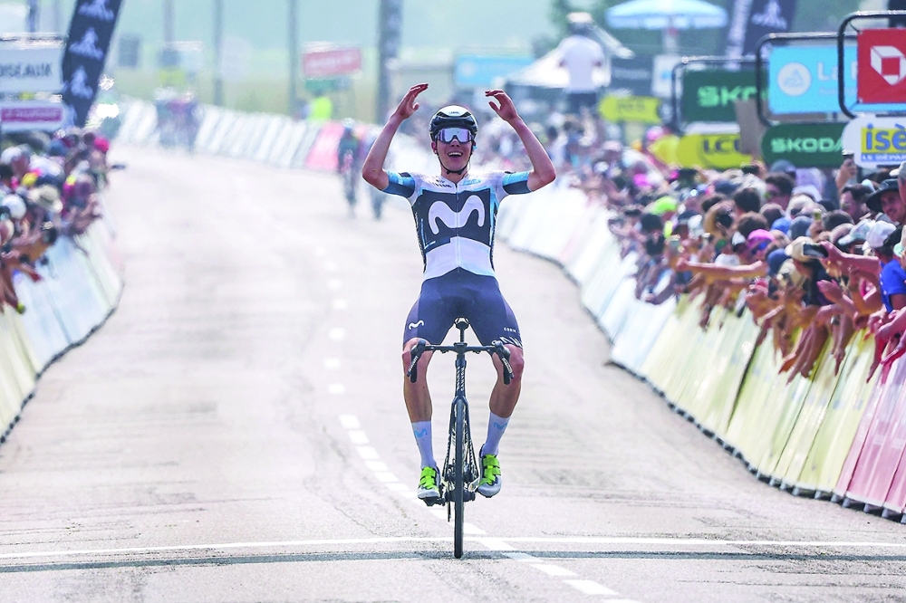 Ivan Romeo celebrates as he crosses the finish line. — AFP