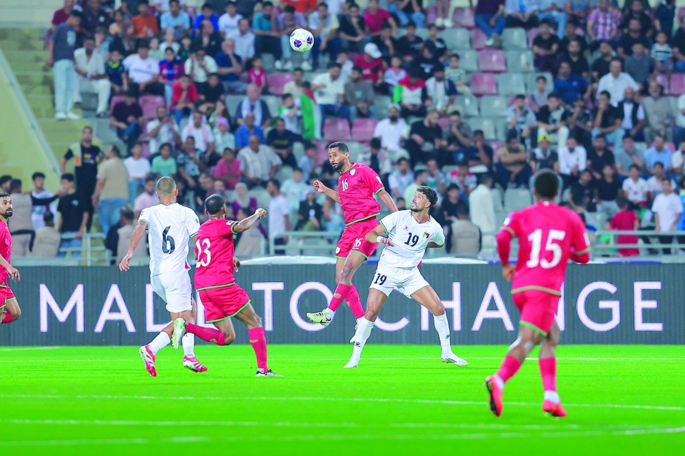 Oman and Palestine players in action