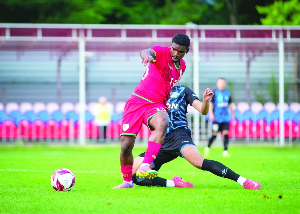 Oman and Saturn Ramenskoye FC player fight for the ball