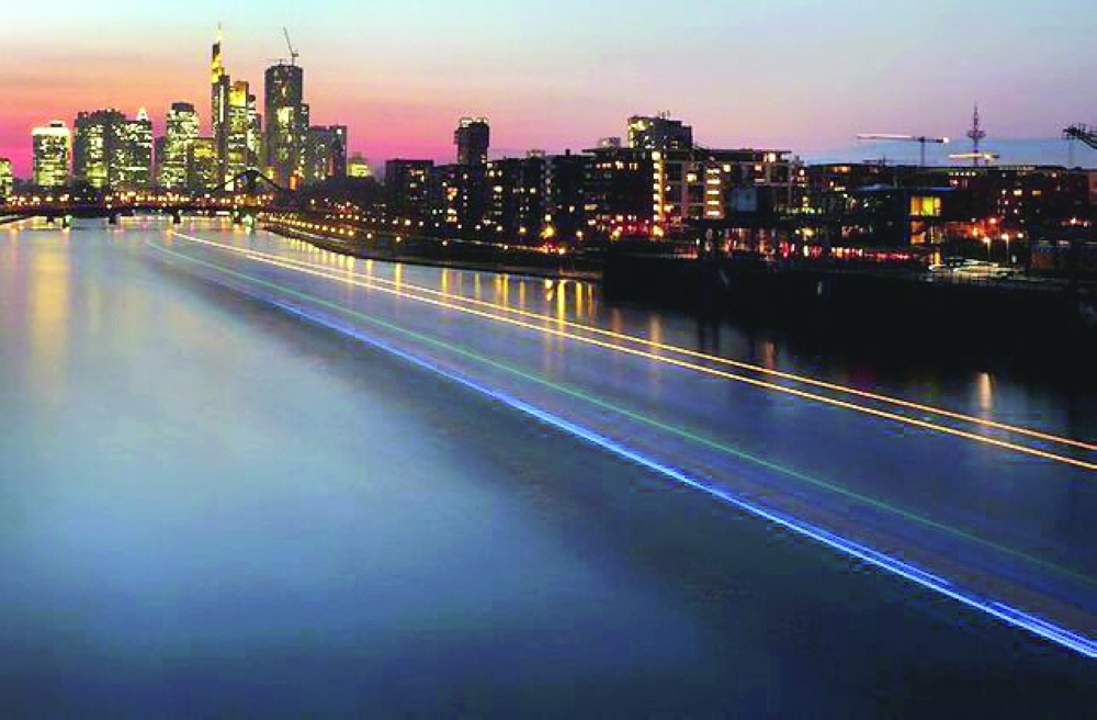 The skyline with the banking district is seen during sunset in Frankfurt. — Reuters File