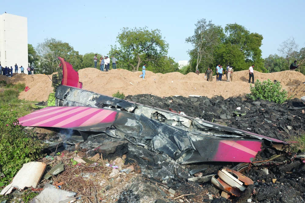 Wreckage of a Boeing 787 Dreamliner lies at the site where the Air India plane crashed in Ahmedabad, India, June 12, 2025. 