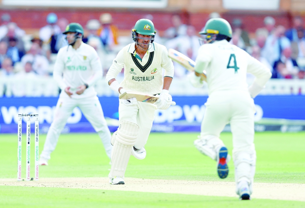 Australia's Starc and Alex in action. — Reuters