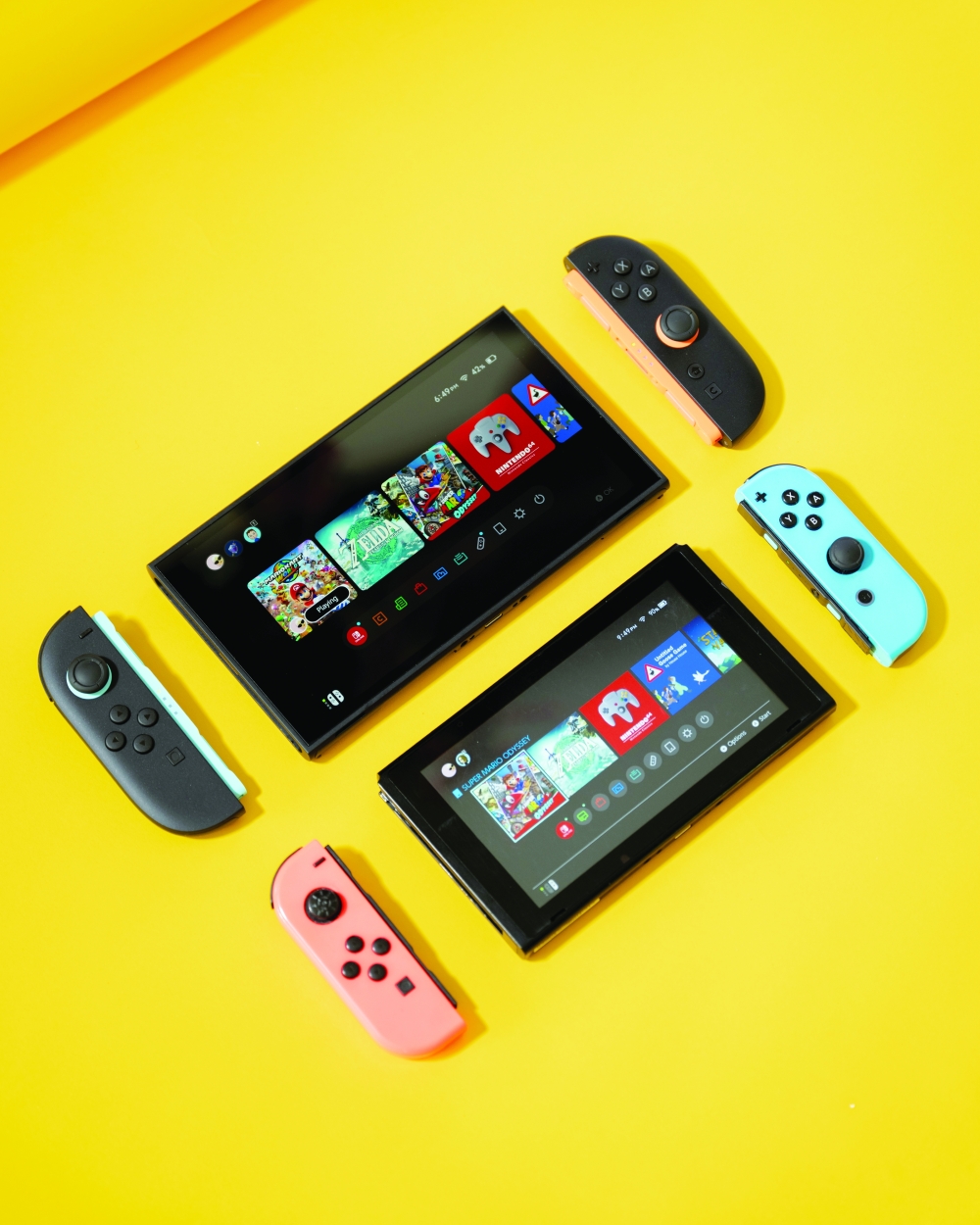 A comparison of the Nintendo Switch 2, top and the original Switch, in Renton, Wash.