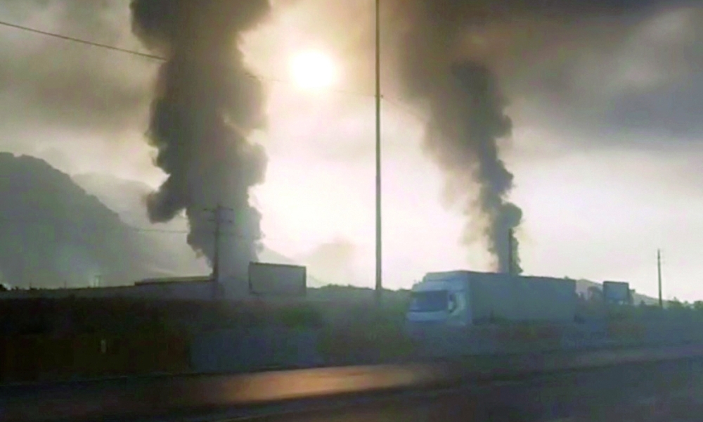 Smoke rises after Israeli strike, in Kermanshah