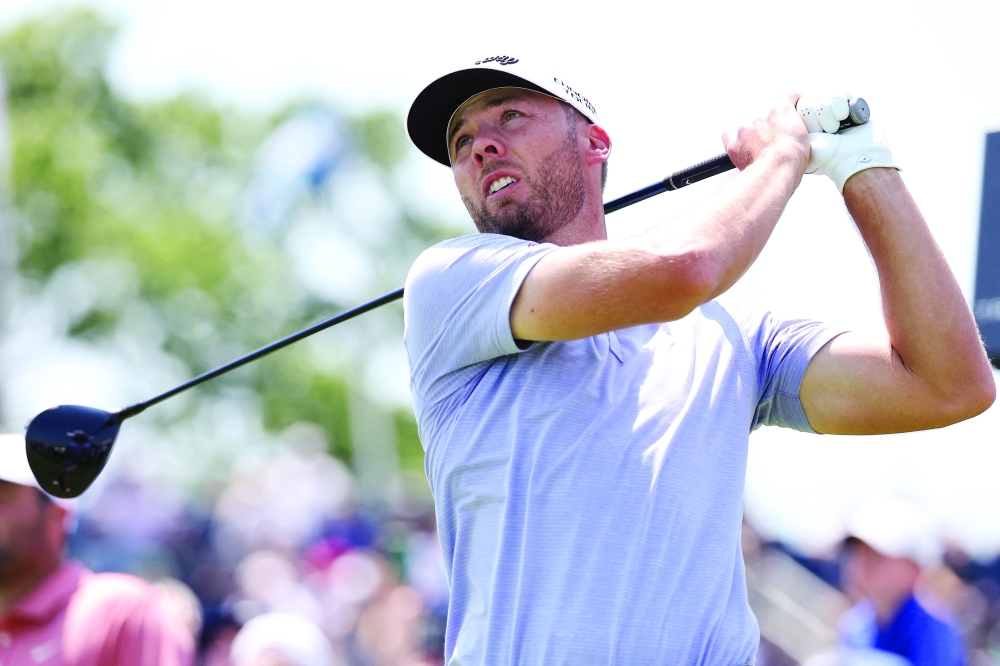 Sam Burns plays his shot from the 12th tee. — Reuters 