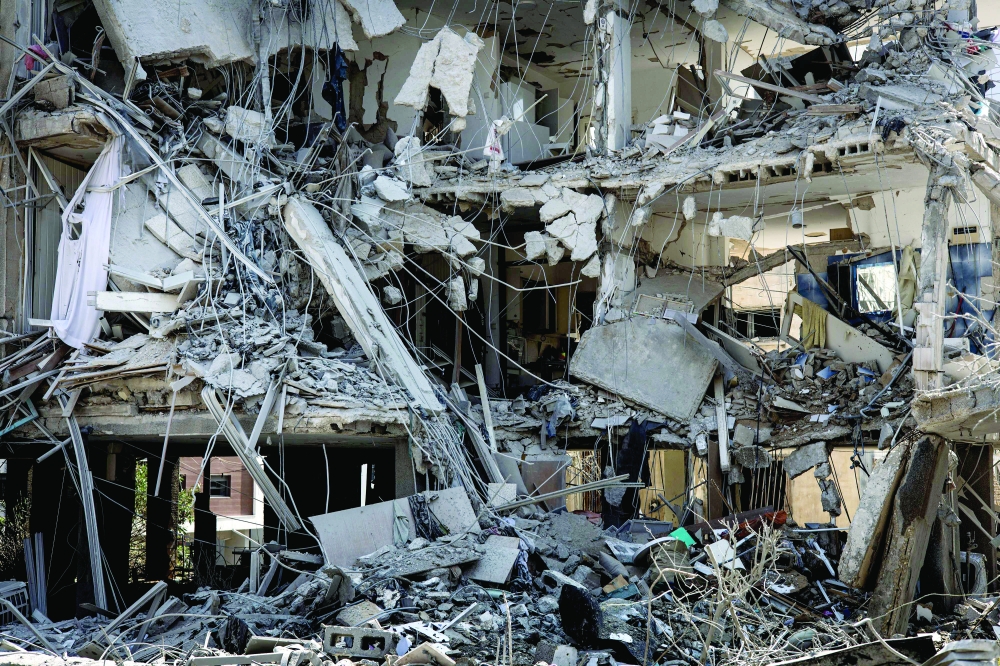 A destroyed building is pictured at a site in Tel Aviv hit by a missile fired from Iran. —  AFP