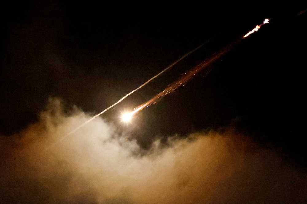 A missile launched from Iran towards Israel is seen from Ramallah. — Reuters 