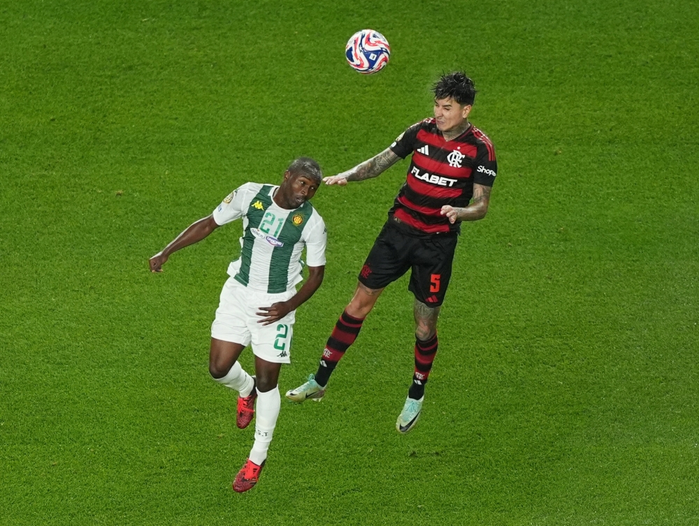 Esperance Sportive de Tunis' Abdramane Konate in action with Flamengo's Erick Pulgar. — Reuters