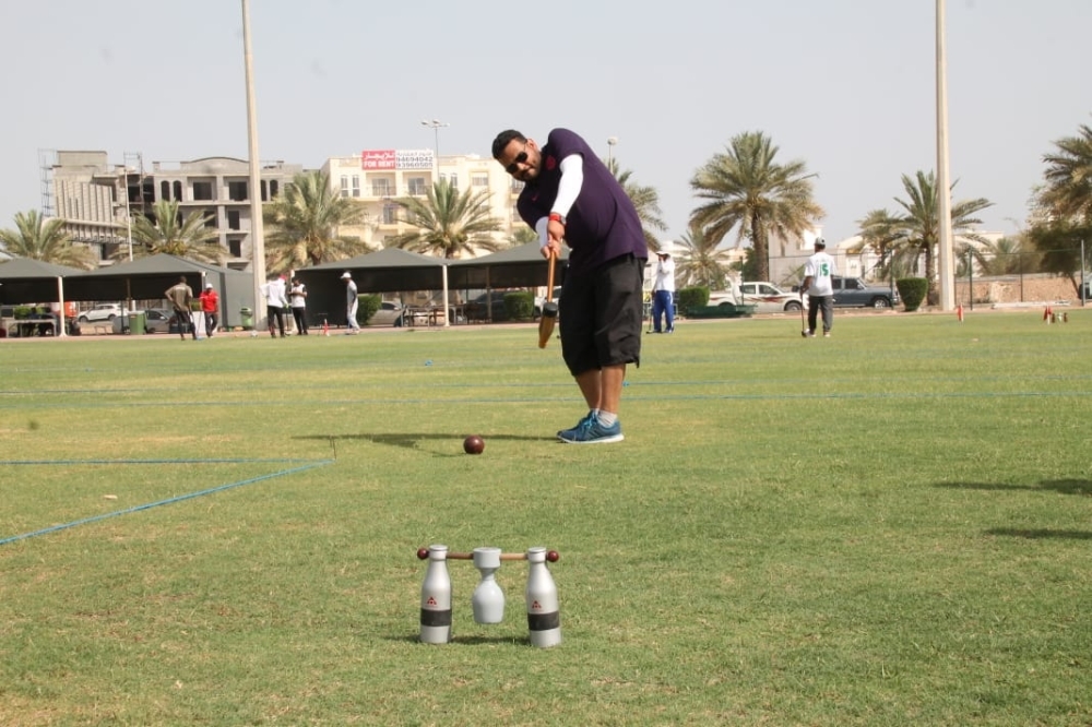Woodball can be played on beaches, sand, grass, or even uneven surfaces