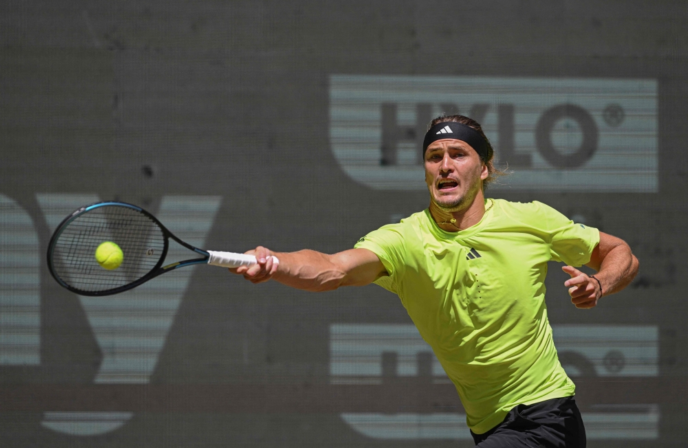 Germany's Zverev returns ball to Italy's Flavio. — AFP