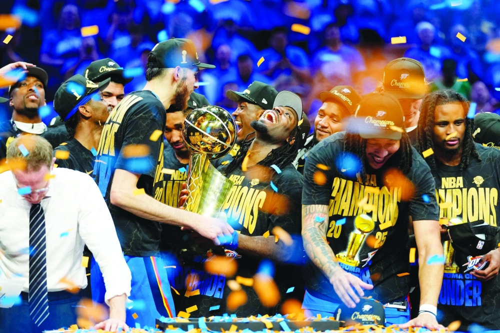 Oklahoma City Thunder guard Luguentz Dort (5) celebrates after winning game seven of the 2025 NBA Finals. — Reuters