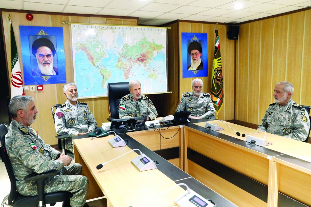 Iranian Army commander-in-chief Amir Hatami attends a meeting in the Iranian Army's War Command Room. — Reuters