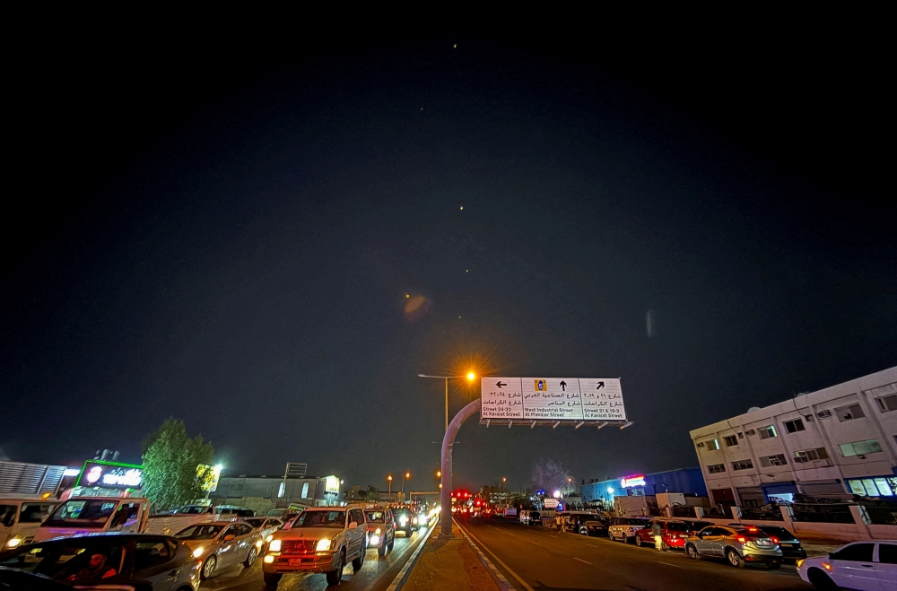 Traces are seen in the sky after Iran's armed forces say they targeted The Al-Udeid base in a missile attack
