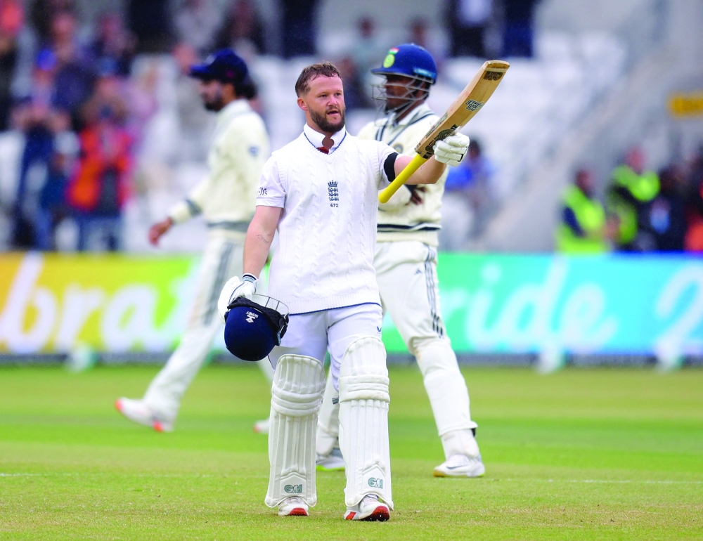 Ben Duckett celebrates his century.  — Reuters