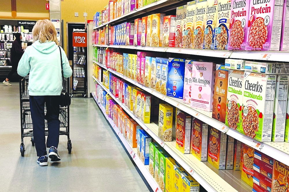 A woman is seen shopping inside a grocery store in Washington. — Reuters