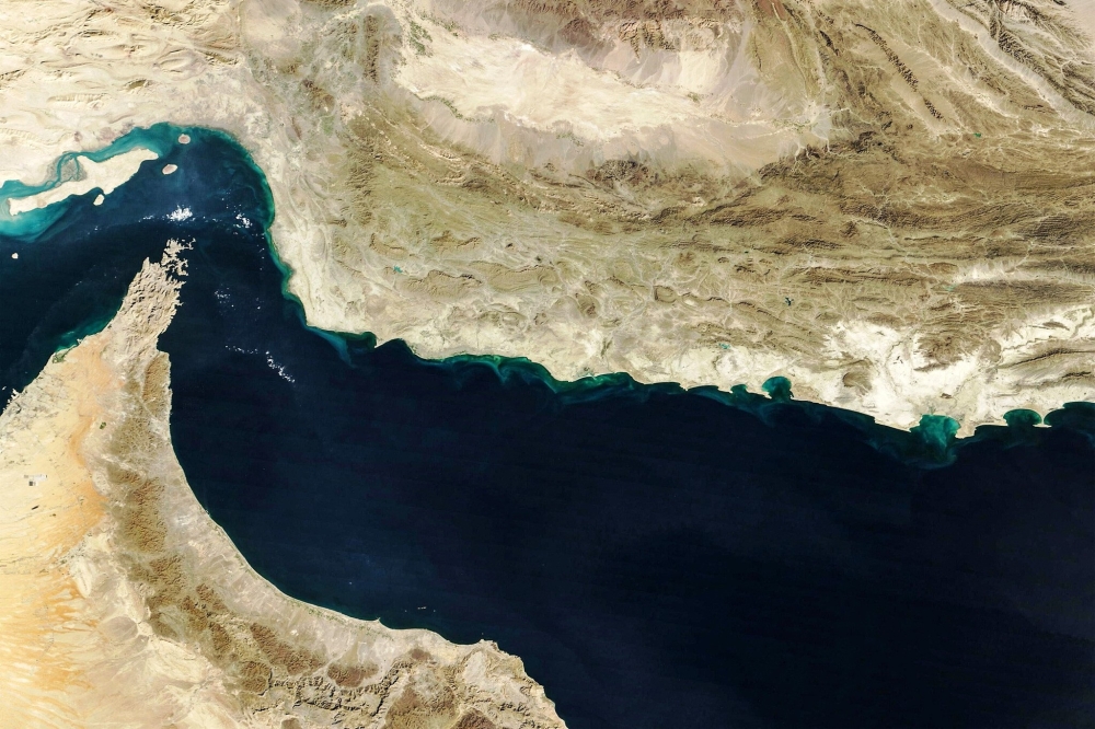 This handout natural-colour image acquired with MODIS on NASA's Terra satellite taken on February 5, 2025 shows the Gulf of Oman and the Strait of Hormuz. — AFP