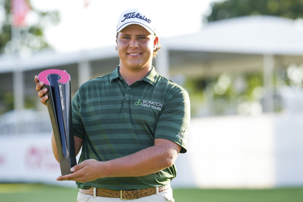  Aldrich Potgieter poses with the trophy. — Reuters