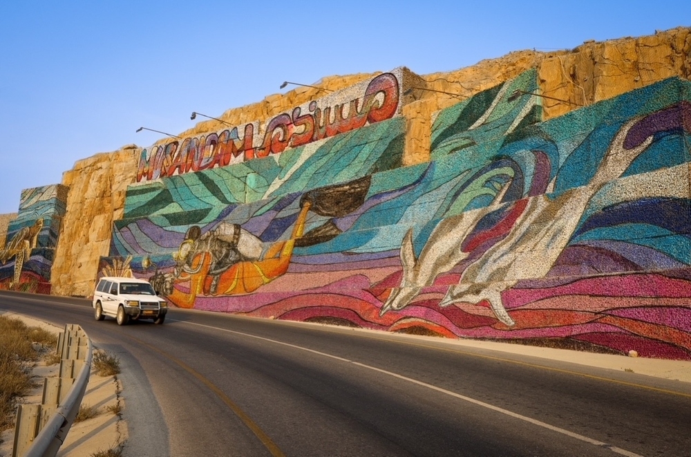 The mural, created by Omani artist Abdulaziz al Shehi, stretches 70 meters in length and 14 meters in height.