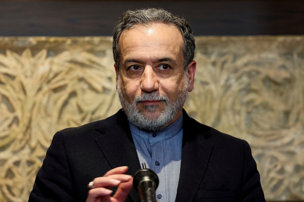 Iranian Foreign Minister Abbas Araqchi looks on as he speaks to the media. — Reuters