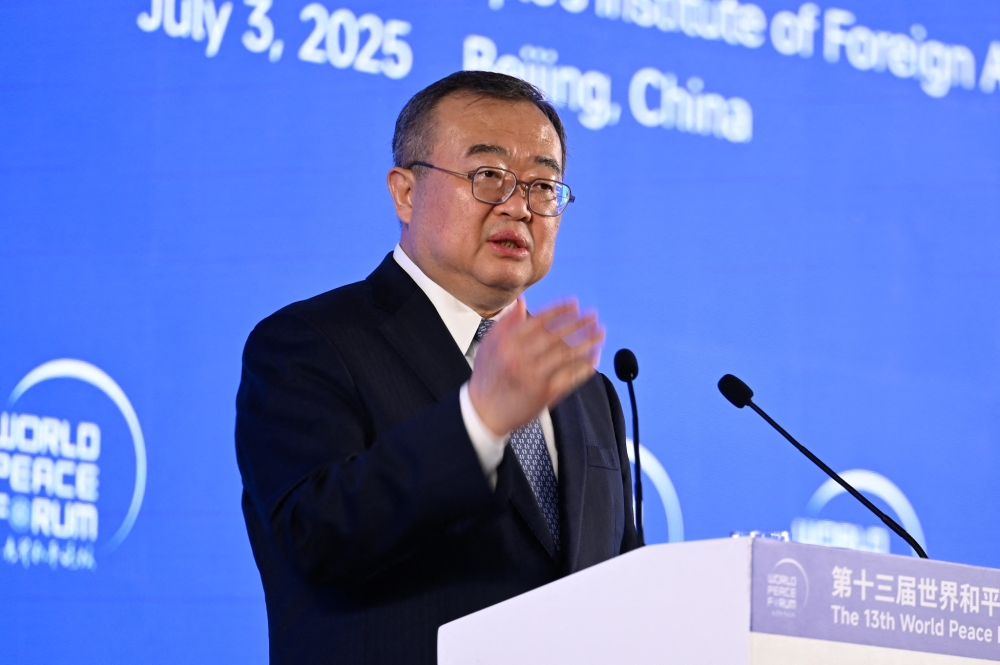 Liu Jianchao speaks during the 13th World Peace Forum in Beijing. — AFP