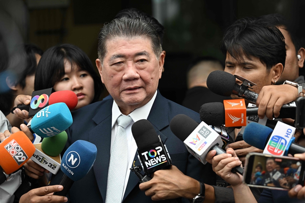 Thailand new acting PM Phumtham Wechayachai speaks to media, in Bangkok. — AFP