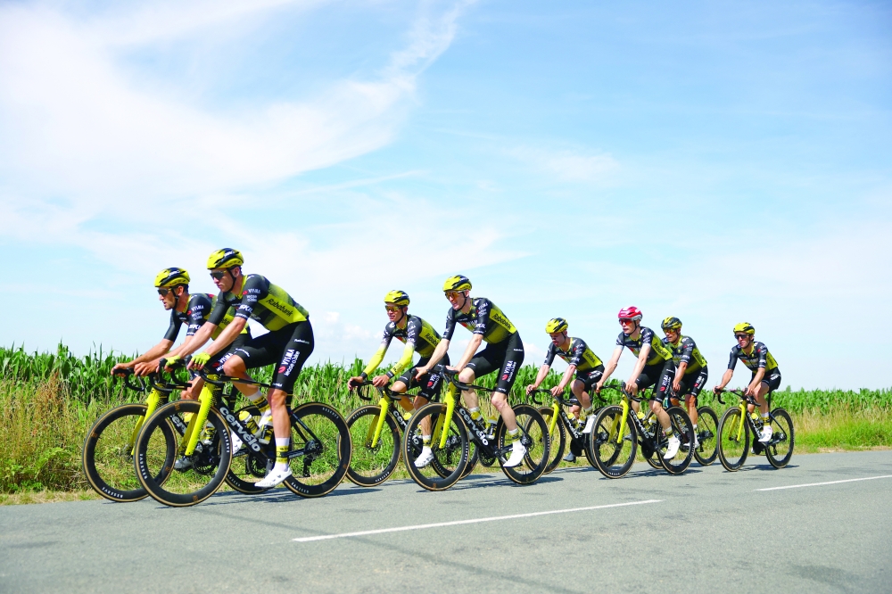 Lease a Bike's Vingegaard with teammates during training. — Reuters