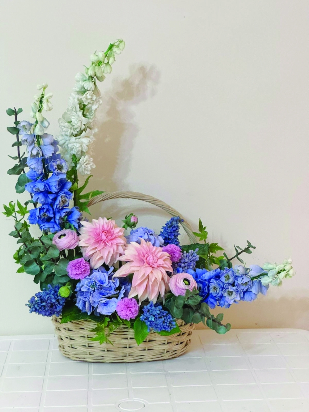 Summer arrangement in a basket