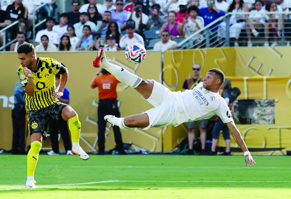Real Madrid's Kylian Mbappe scores their third goal. — Reuters