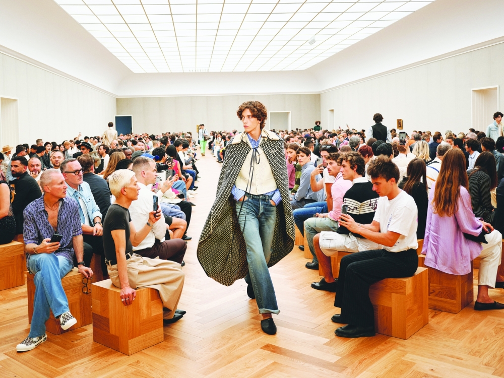 A model presents a look at the Dior spring 2026 fashion show in Milan in June 2025. (Simbarashe Cha/The New York Times)