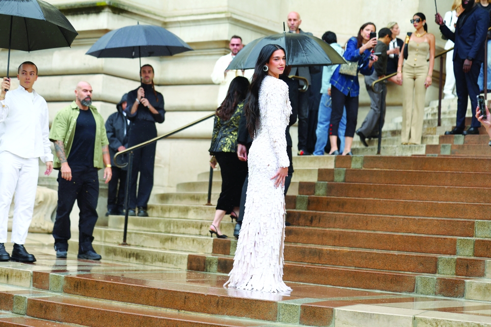 Dua Lipa arrives to attend the Schiaparelli Haute Couture Fall/Winter 2025-2026 collection show in Paris, France, July 7, 2025. REUTERS
