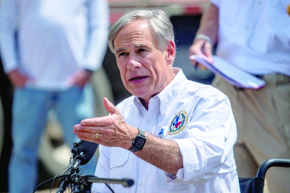 Texas Governor Greg Abbott speaks at a press conference in the aftermath of deadly flooding in Hunt, Texas. — Reuters