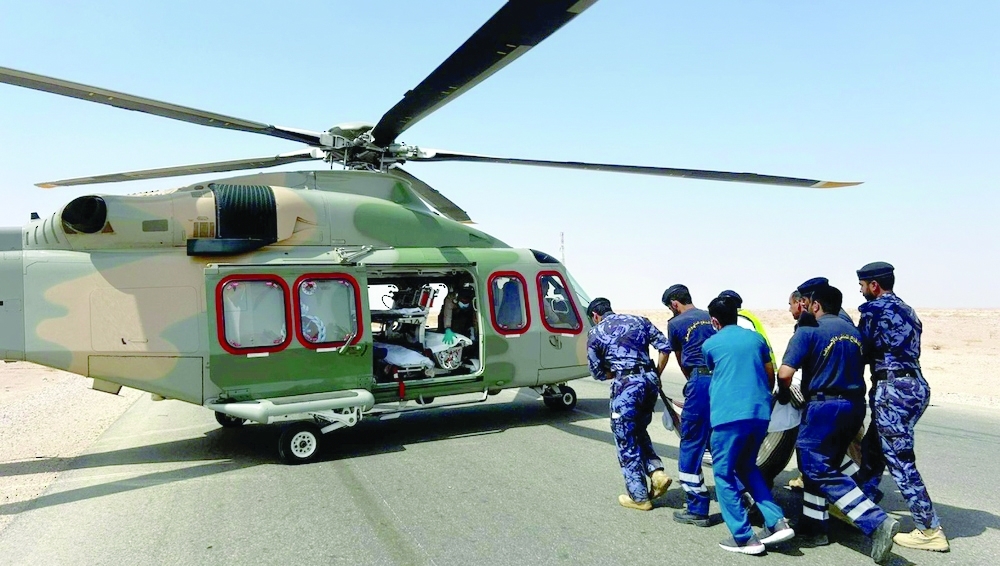 Police aviation units airlift the injured and the deceased to Thamrait Hospital