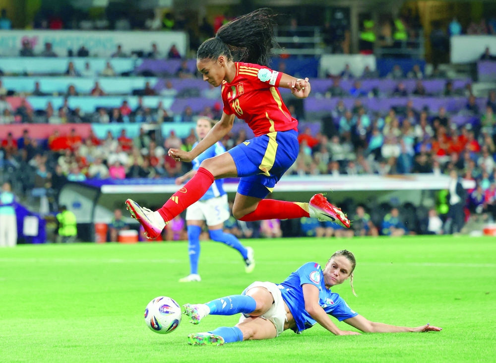  Spain's Salma Paralluelo in action with Italy's Cecilia Salvai. —  Reuters