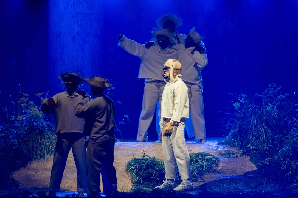 Puerto Rican singer Bad Bunny performs onstage during the first show of his 30-date concert residency at the Coliseo de Puerto Rico in San Juan, Puerto Rico, on July 11, 2025.  (Photo by Ricardo ARDUENGO / AFP)

