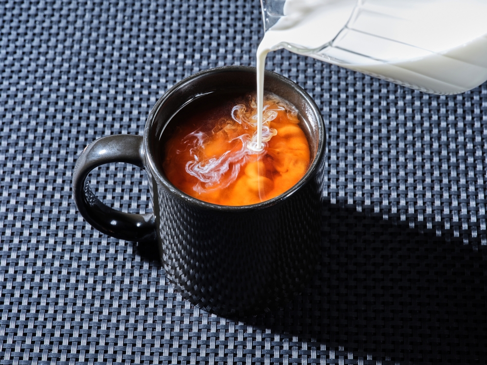 Creamer is poured into coffee in San Francisco, on April 3, 2025. (Kelsey McClellan/The New York Times)
