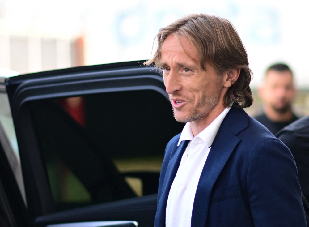 Luka Modric arrives in Milan before signing for AC Milan. — Reuters