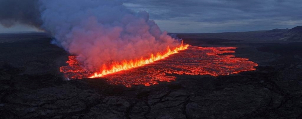 Lava emerges through a fissure following a volcano eruption near Grindavik on Wednesday. — Reuters