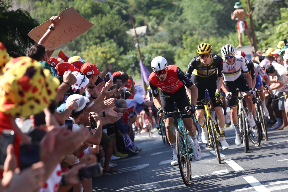 (From L) Arkea-B&B Hotels team's French rider Kevin Vauquelin, Team Visma - Lease a bike team's US rider Matteo Jorgenson, UAE Team Emirates - XRG team's Slovenian rider Tadej Pogacar, Team Visma - Lease a bike team's Danish rider Jonas Vingegaard, cycle in the ascent of the Cote de Pech David during the 11th stage of the 112th edition of the Tour de France cycling race, 156.8 km starting and finishing in Toulouse, southwestern France, on July 16, 2025. (Photo by Anne-Christine POUJOULAT / AFP)
