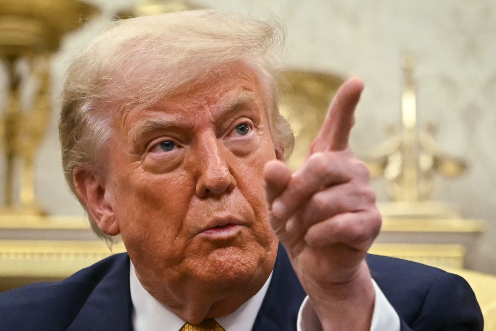 US President Donald Trump speaks during a meeting with Bahraini Crown Prince Salman bin Hamad al Khalifa in the Oval Office of the White House in Washington, DC. — AFP