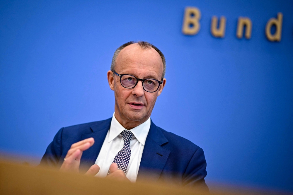German Chancellor Friedrich Merz addresses a press conference on home and foreign policy in Berlin. — AFP