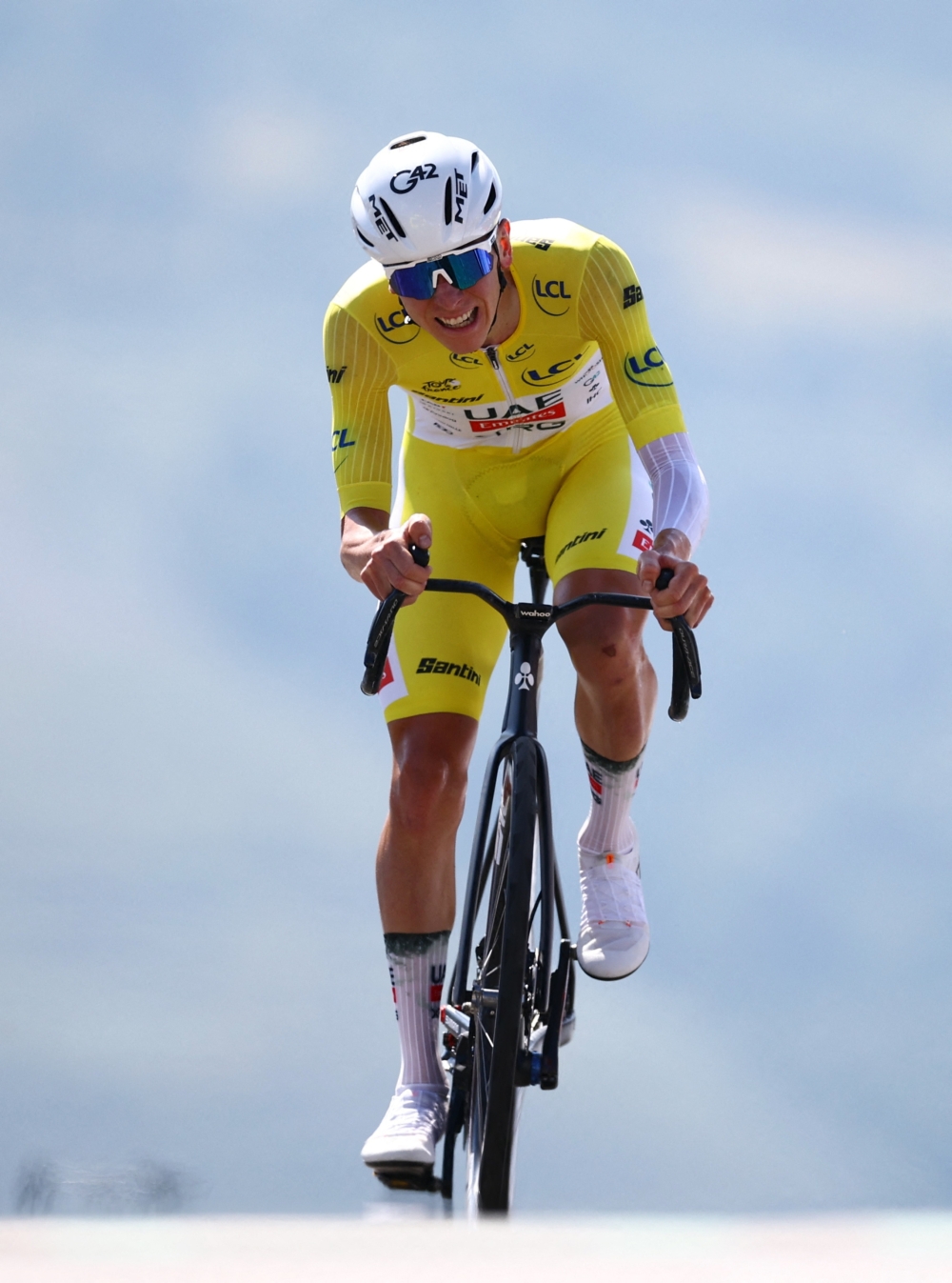 UAE Team Emirates XRG's Tadej Pogacar in action before crossing the finish line to win stage 13. — Reuters