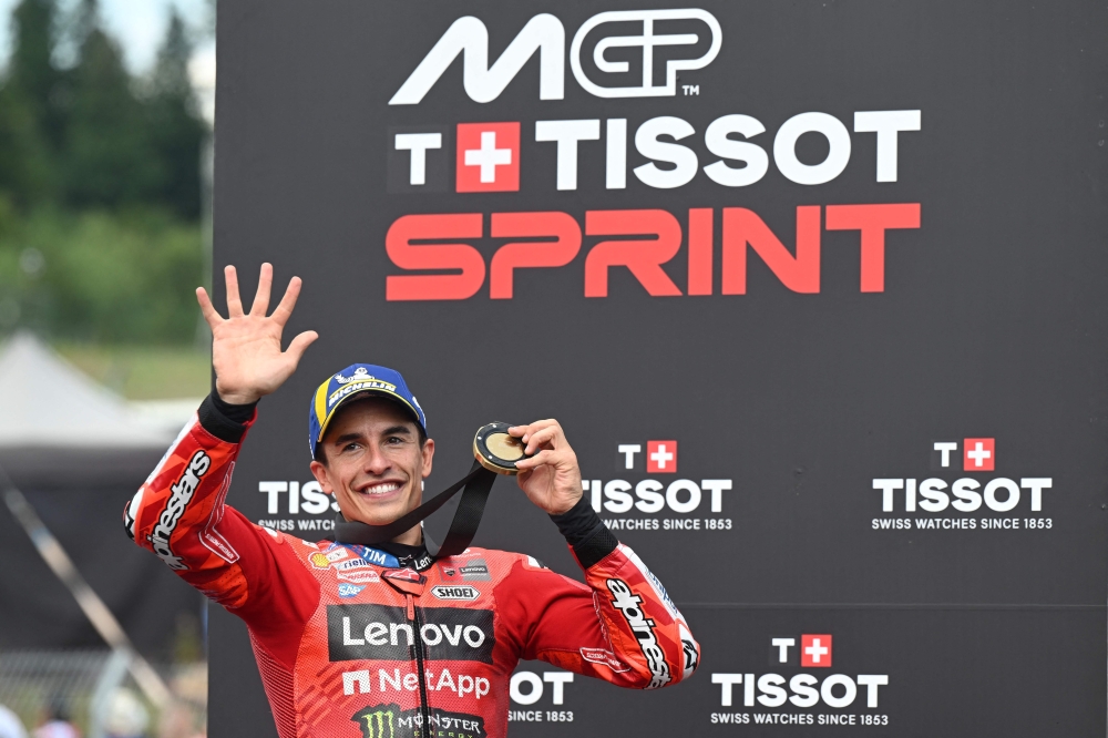 Spanish MotoGP rider Marc Marquez celebrates the winning. — AFP