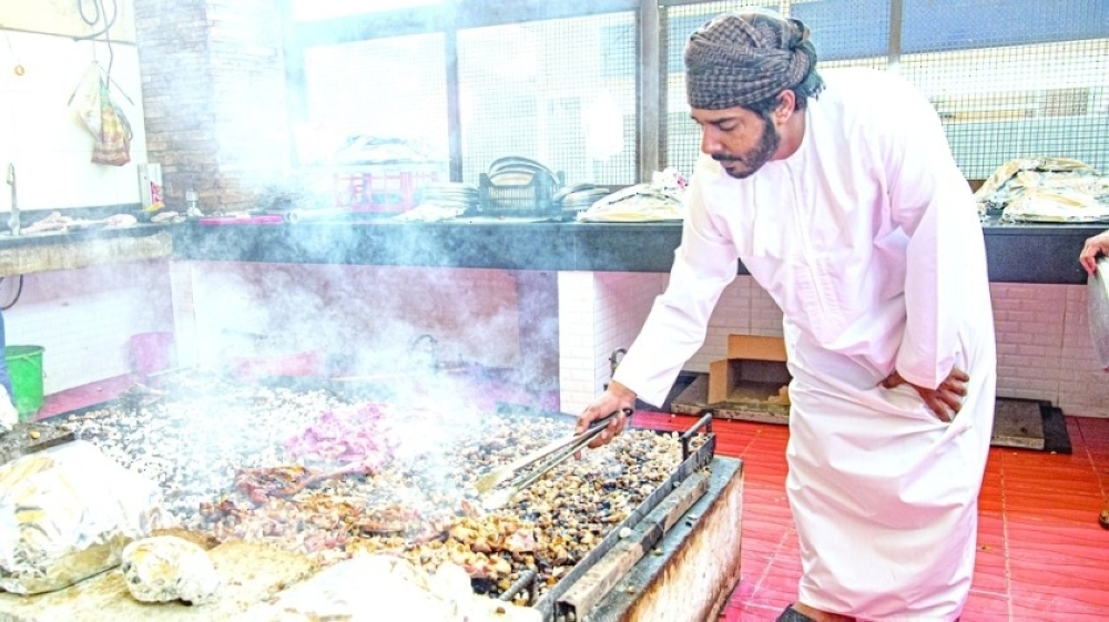 Whether grilling madhbi over hot stones or preparing ma’jeen the traditional way — by slow-cooking preserved meat in rendered fat — they are carrying forward practices passed down through generations