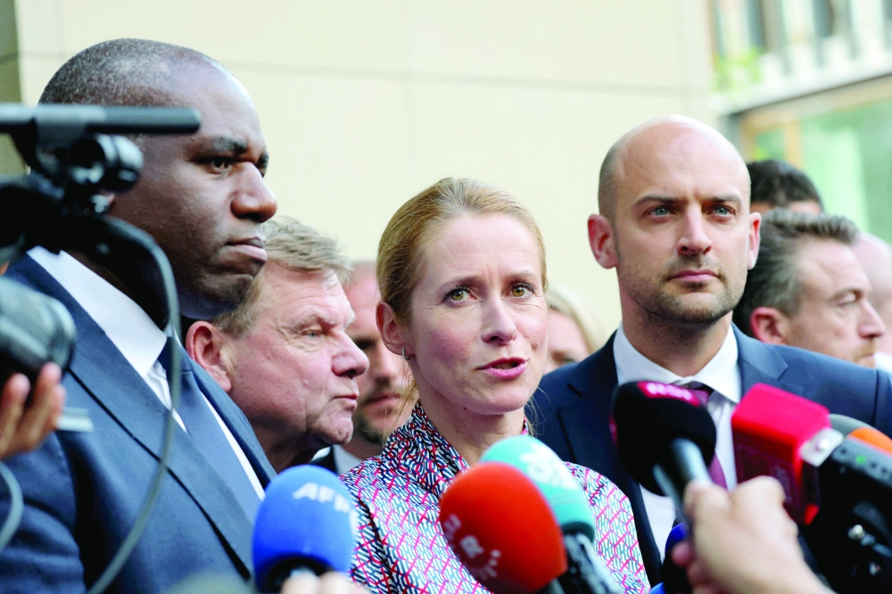 EU High Representative for Foreign Affairs and Security Policy, flanked by European officials, speaks to media, in Geneva. — Reuters
