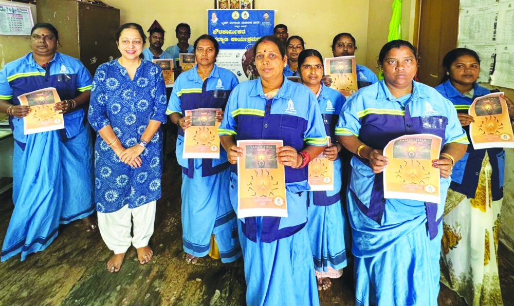 Tamoghna Foundation conducted a special yoga session for sanitation workers on International Yoga Day